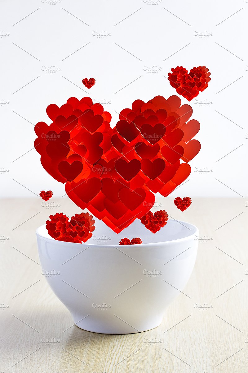 心脏背景在杯子Valentine hearts in a c