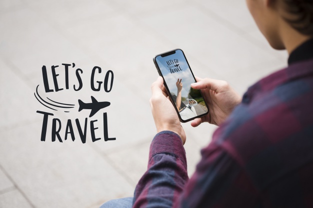 手持iphone手机展示样机 Let’s go travel